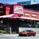 Illustration for article titled Chasing Canada's Greasiest People's Food In A $200,000 Aston Martin